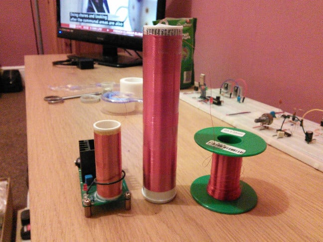 Finished Slayer Exciter secondary next to eBay Tesla coil Finished Slayer Exciter secondary next to eBay Tesla coil